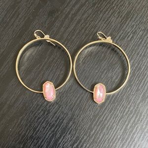 Kendra Scott gold with pink gemstone hoop earrings.